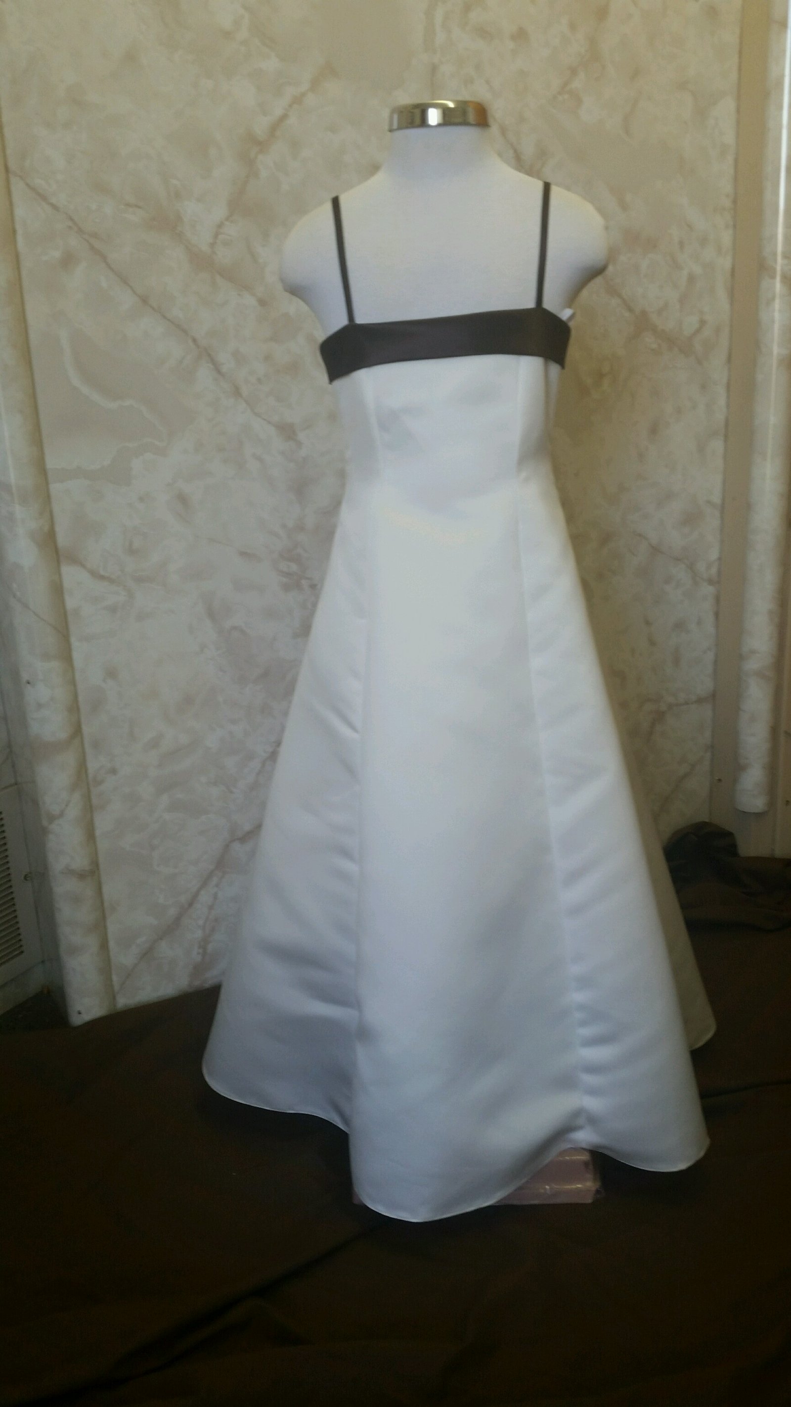 light ivory flower girl dress with brown trim